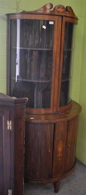 Lot 1337 - A Sheraton Revival mahogany and inlaid two tier bowfront display cabinet (probably associated) with