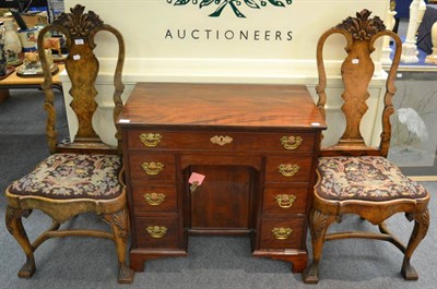 Lot 1347 - A pair of Queen Anne style dining chairs, circa 1920, with acanthus carved top rails above...