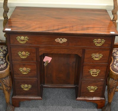 Lot 1348 - A 19th century mahogany knee hole desk