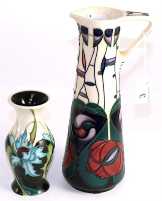 Lot 3 - A Moorcroft pottery slim jug dated '95', together with a small Moorcroft vase dated 2006 (2)