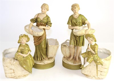 Lot 20 - A pair of Royal Dux figures modelled as male and female basket carriers and a pair of Royal Dux...