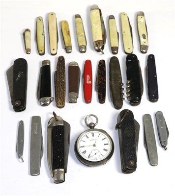 Lot 35 - A silver cased key wind pocket watch and a small quantity of folding pocket knives