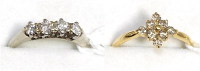 Lot 39 - A 9ct gold diamond four stone ring and a 9ct gold diamond cluster ring (2)