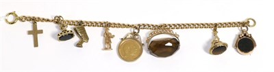 Lot 44 - A charm bracelet with an Edward VII half sovereign and fobs