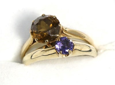 Lot 46 - A 9ct gold citrine ring and a 9ct gold tanzanite ring