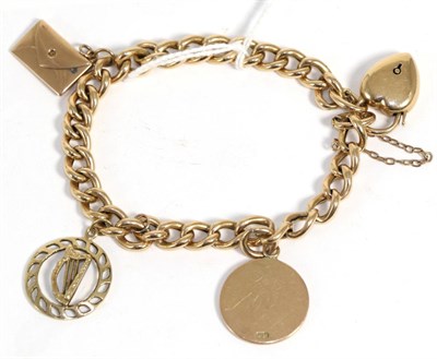 Lot 55 - A gold charm bracelet stamped '15'