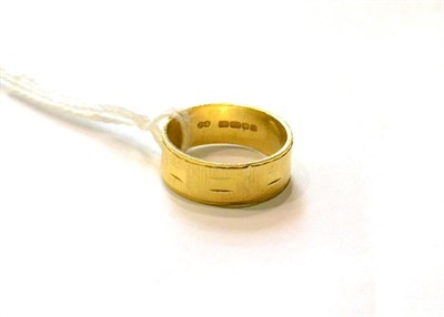 Lot 61 - An 18ct gold band ring