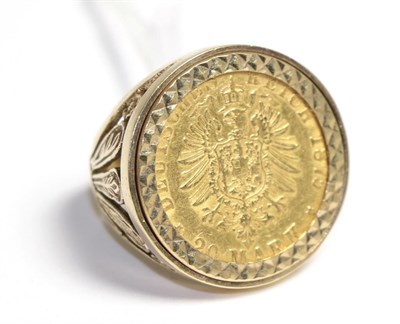 Lot 75 - A Hamburg 20 marks coin, 1875, J, loose mount in a 9ct gold ring
