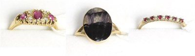 Lot 77 - An 18ct gold ruby and diamond ring, a Blue John ring and a gem set ring (3)