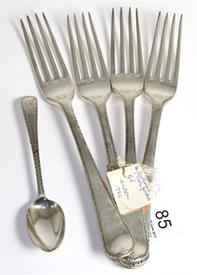 Lot 85 - A set of four George III silver feather edge table forks, George Smith 1780 and a bright...