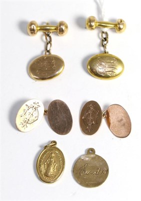 Lot 103 - A pair of 9ct gold cufflinks, a pair of 15ct gold cufflinks and two small 9ct gold pendants