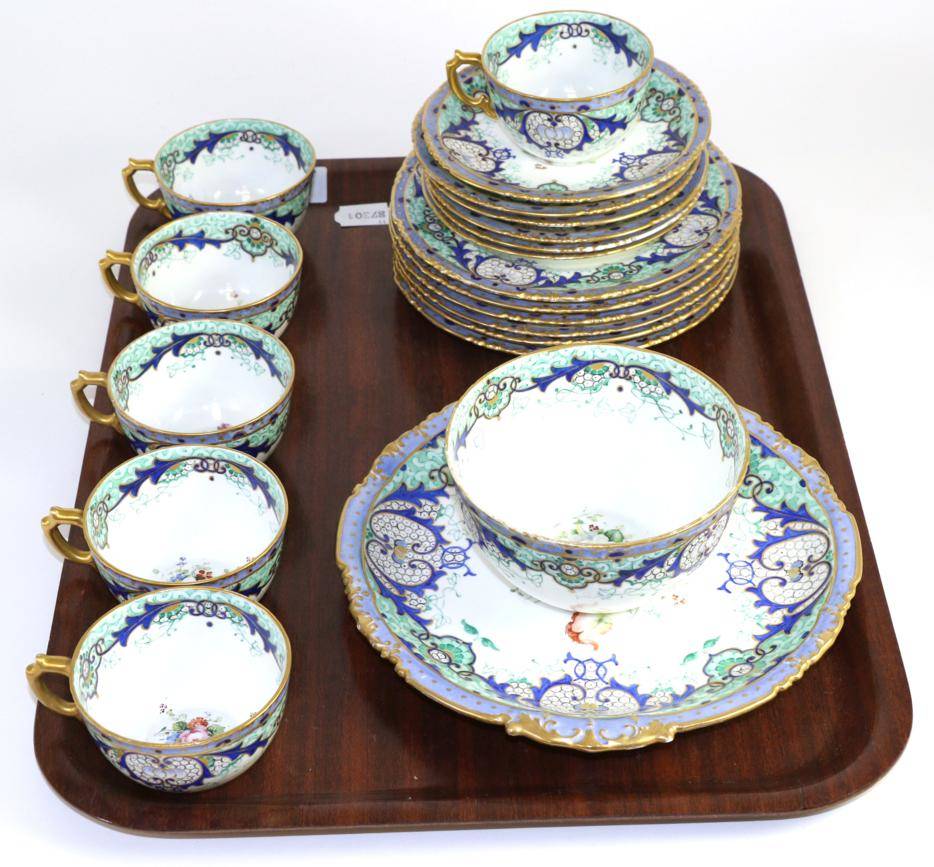 Lot 117 - A Royal Crown Derby part tea service with floral decoration and gilt highlights, signed H Webster