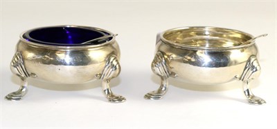 Lot 139 - A pair of George II silver cauldron salts, makers mark indistinct. London 1736, missing liner,...