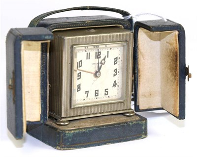 Lot 142 - A Zenith travelling alarm timepiece, cased