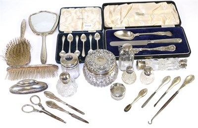 Lot 148 - A group of paste silver including teaspoons, hairbrushes, a small group of silver topped...
