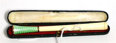 Lot 175 - A 1920's ivory, gold and enamel cheroot holder, cased