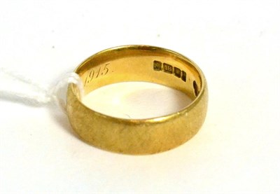 Lot 177 - An 18ct gold band ring