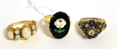 Lot 185 - A 9ct gold opal ring, a gem set ring stamped '14K' and a 9ct gold pietra dura ring (3)