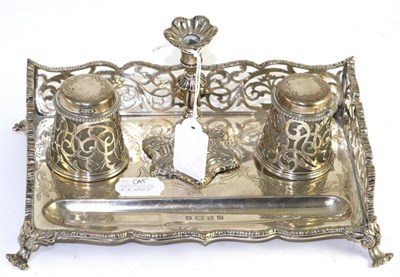 Lot 201 - A silver inkstand, Edward & John Barnard, London 1856, with a pierced gallery, two inkwells...