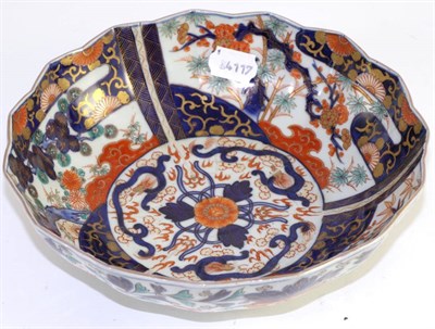 Lot 209 - An Imari bowl, undulating rim, underglaze blue, overlaid iron red, green and gilt...