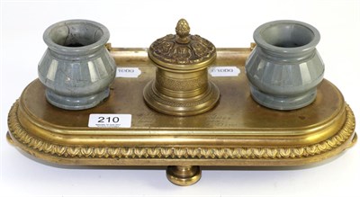 Lot 210 - A Russian gilt bronze and hardstone desk stand, with inscription, dated in acrylic 1922,...