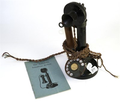 Lot 217 - An early 20th century telephone ";The Automatic Telephone System"; with original booklet