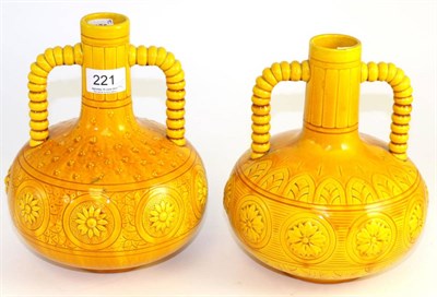Lot 221 - A matched pair of Burmantofts faience bottle vases model No.435, each in a mustard glaze with...