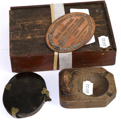 Lot 232 - A Mouseman ashtray together with a large tortoiseshell magnifier, a set of bone dominoes and a...