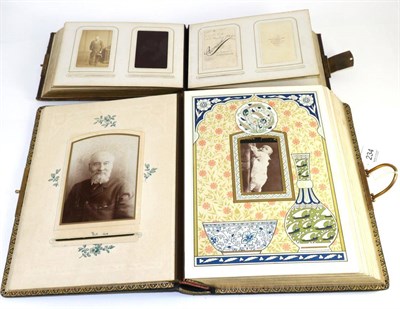 Lot 234 - Two Victorian leather photograph albums, mostly portrait subject matter