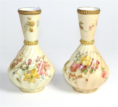 Lot 237 - A pair of Royal Worcester blush ivory vases, with floral and gilt decoration