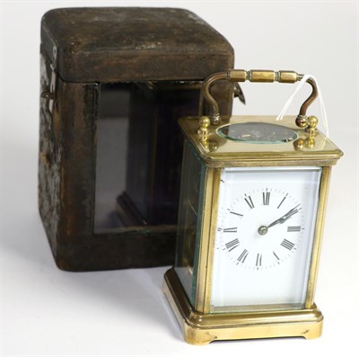 Lot 249 - A brass striking carriage clock, with travelling case
