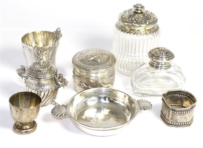 Lot 251 - A small group of white metal including a porringer, a mustard, egg cup etc together with a...