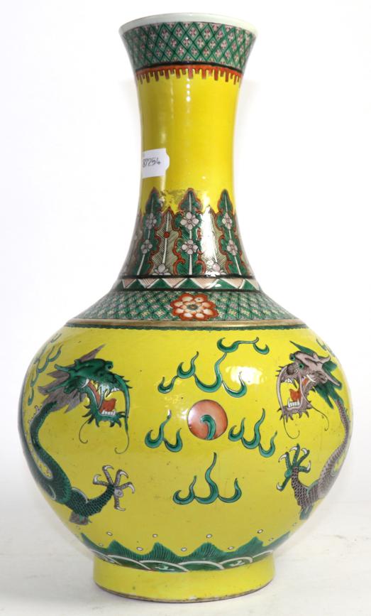 Lot 278 - A Chinese yellow ground porcelain dragon vase (restored)