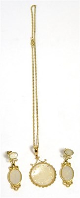Lot 288 - A Chinese mother of pearl necklace and earring set stamped '14K'