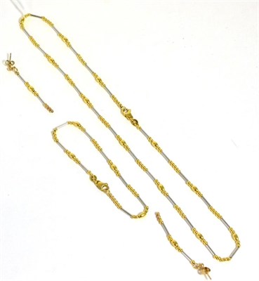 Lot 302 - A 9ct two colour gold necklace, bracelet and earring set