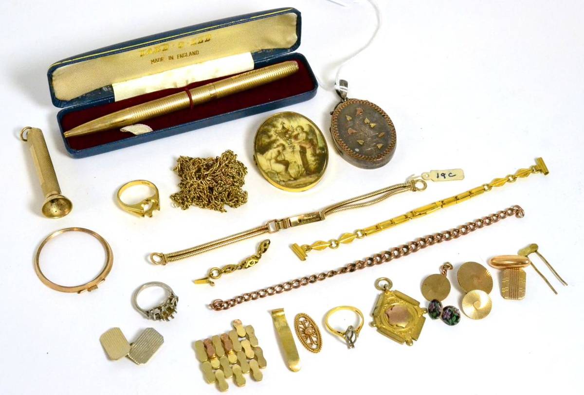 Lot 305 - A 9ct gold Yard-O-Lead pencil, 9ct gold cigar cutter, a 9ct gold medallion, a quantity of gold...