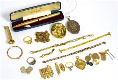 Lot 305 - A 9ct gold Yard-O-Lead pencil, 9ct gold cigar cutter, a 9ct gold medallion, a quantity of gold...