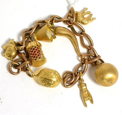 Lot 306 - Charm bracelet set with eight charms including a pearl in a bucket