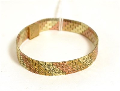 Lot 325 - A 9ct three colour gold bracelet