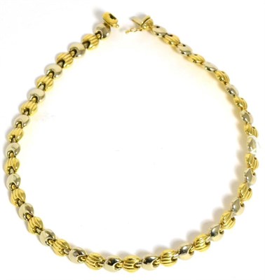 Lot 327 - An 18ct two colour gold necklace