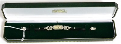 Lot 336 - A diamond set cocktail watch, stamped '9ct'