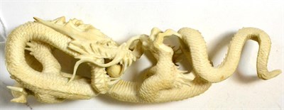 Lot 339 - A late 19th/early 20th century Chinese carved ivory dragon