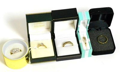 Lot 344 - A diamond half hoop ring, a 9ct gold cubic zirconia solitaire ring, a 9ct gold cubic zirconia...