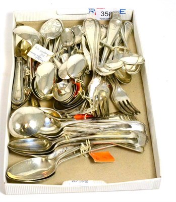 Lot 356 - A large quantity of silver bead edge flatware, George III and later including some American
