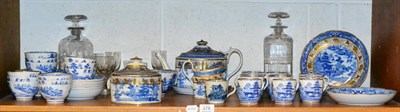 Lot 378 - An early 19th century Miles Mason blue and white tea service including teapot and covered...