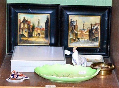 Lot 401 - A collection of ceramics comprising a pair of painted tiles, Dutch townscapes, ebonised frames,...