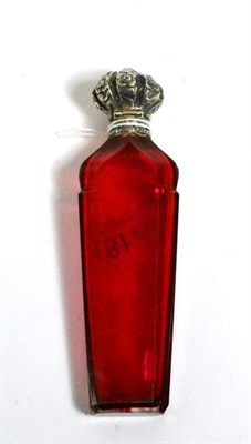 Lot 418 - A Victorian cranberry glass scent flask with hinged silver coloured metal cover