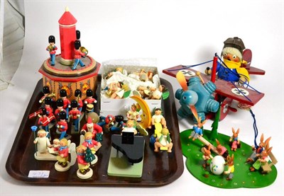 Lot 431 - A collection of German painted wood Christmas ornaments and others including a music box,...