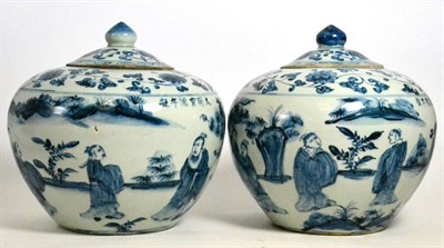 Lot 432 - A pair of Chinese blue and white jars and covers