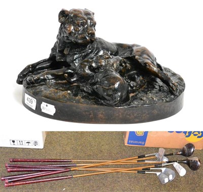 Lot 439 - A bronzed group of a dog and puppies after the model by W. Woolfe, together with a part set of...